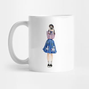 Girl taking photos Mug